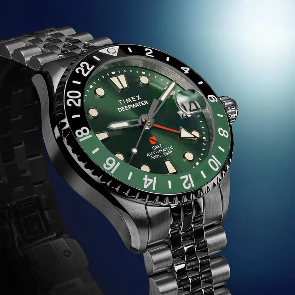 Front view of the green Timex Deepwater Meridian 200 Automatic GMT reference TW2Y64100 on its five-link bracelet