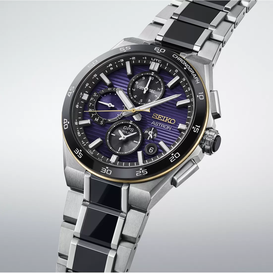 Angled view of the Seiko Astron HAB011J1 purple dial and titanium bracelet