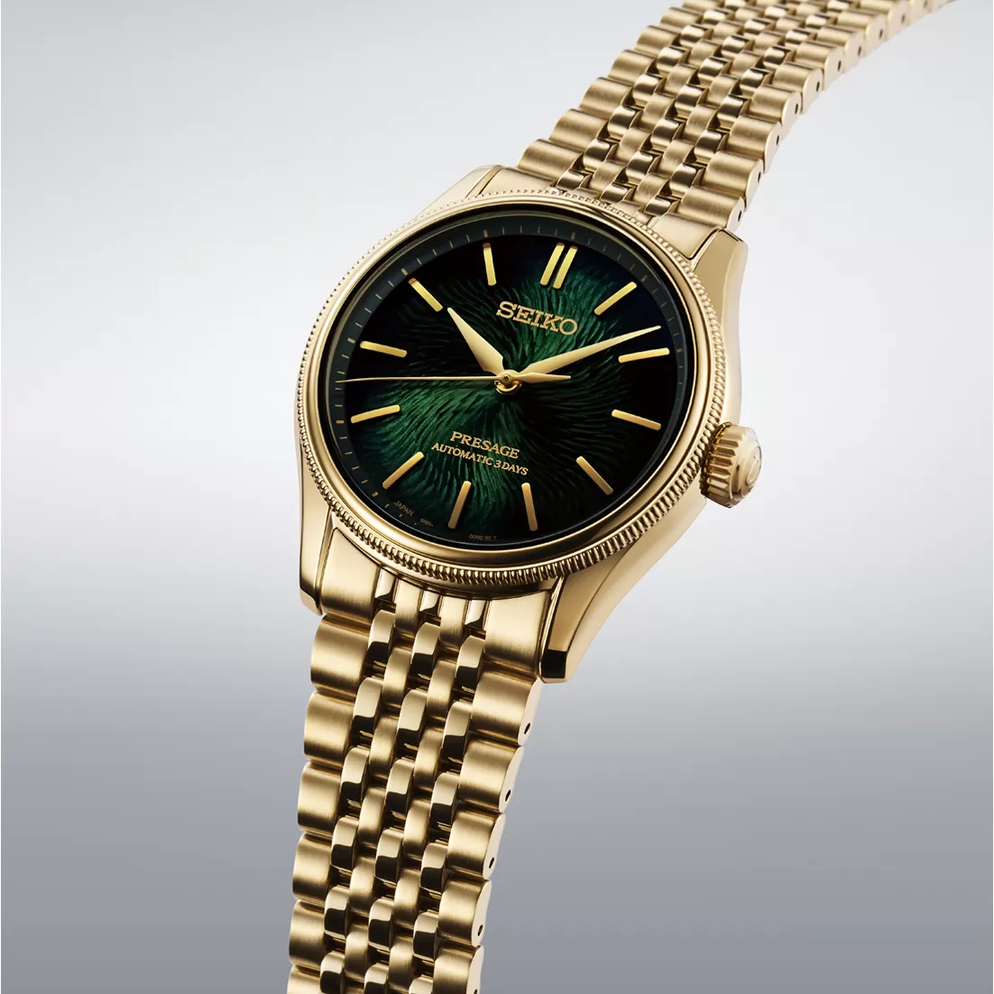 Seiko Presage HCC009J1 with its pine-green textured dial and gold-coloured bracelet