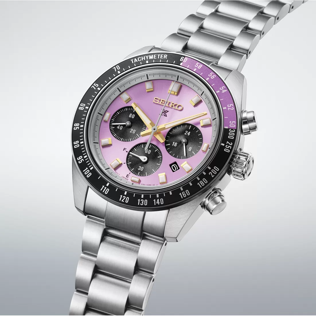 Angled view of the Seiko Prospex Speedtimer HBJ005 showing the brushed steel case and purple tachymeter segment