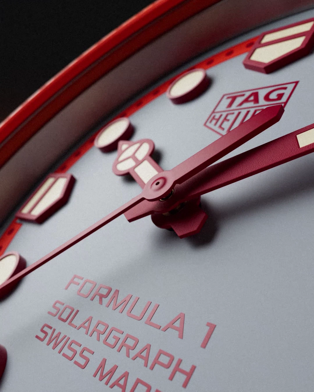 Macro detail of the TAG Heuer Formula 1 Solargraph hands and applied indexes