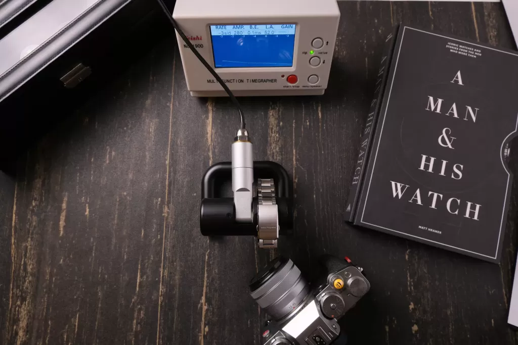 Hamilton Cooper timegrapher test. Dial down: −3 s/day with 0.1 ms beat error.
