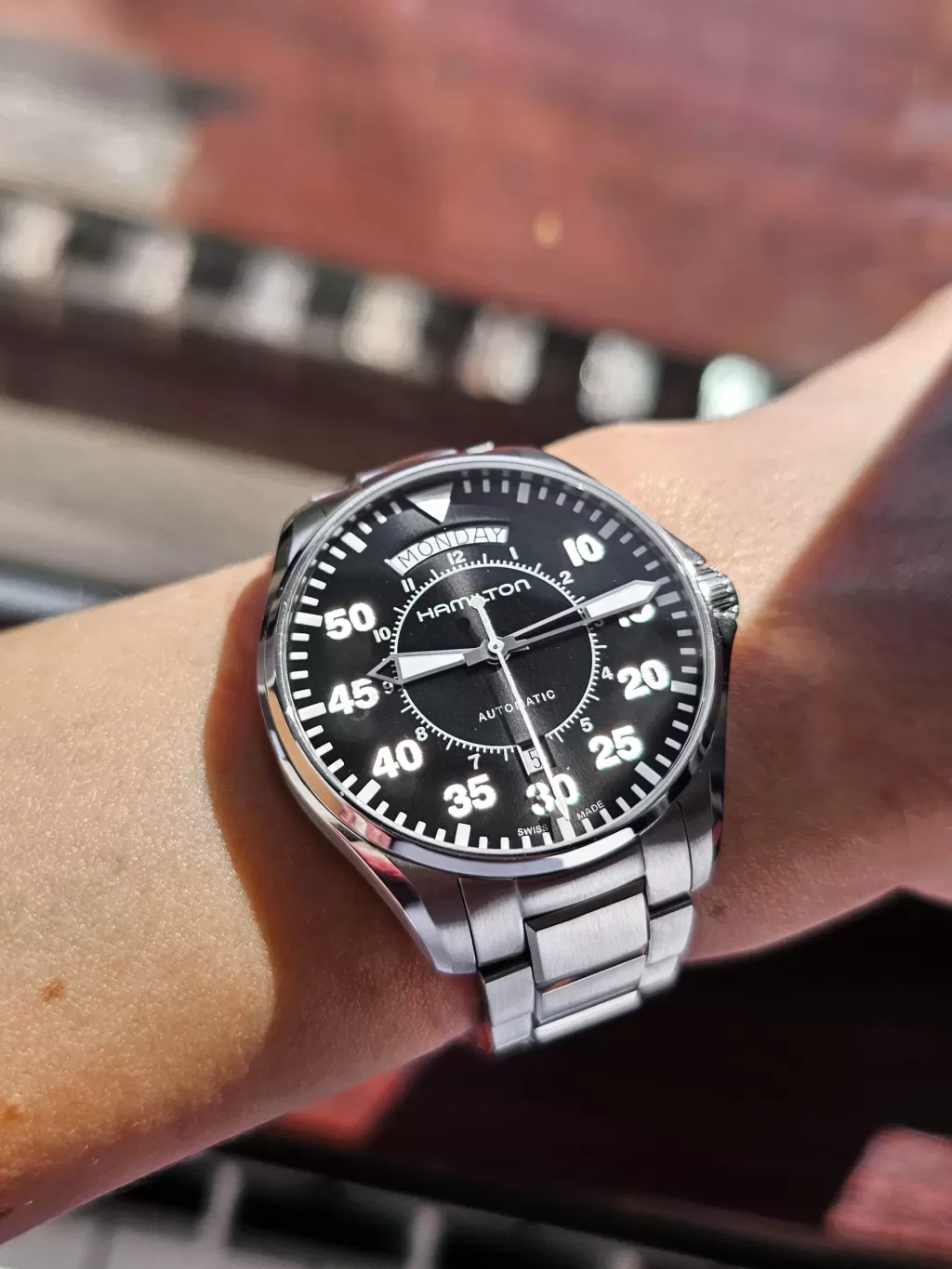 Applied markers on the Hamilton Cooper H64615135 catching sunlight on my wife's 6.5 inch wrist