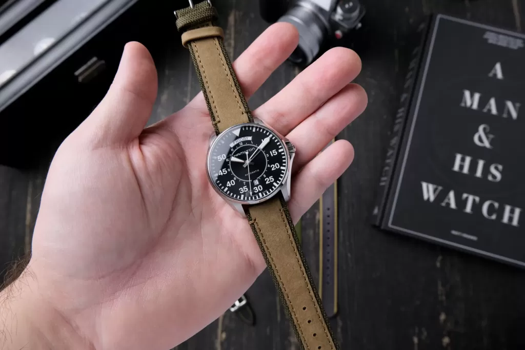 Hamilton Cooper held in my hand on a leather strap
