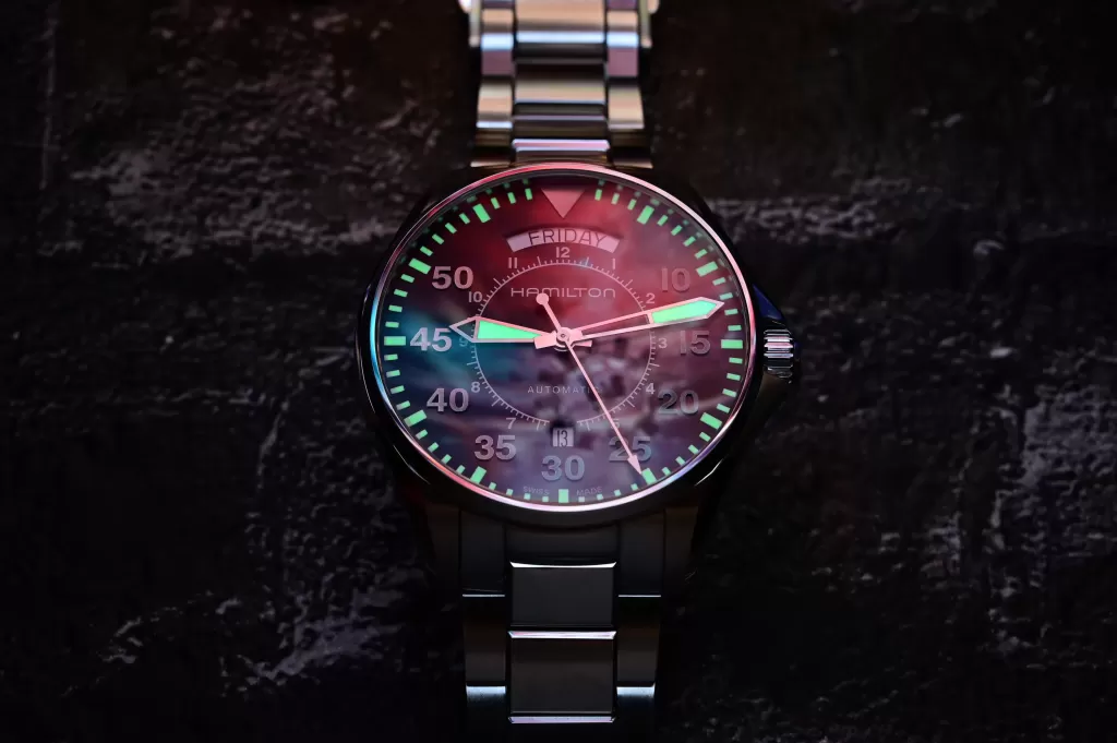 Hamilton Cooper on its bracelet with the luminous hands and minute markers glowing